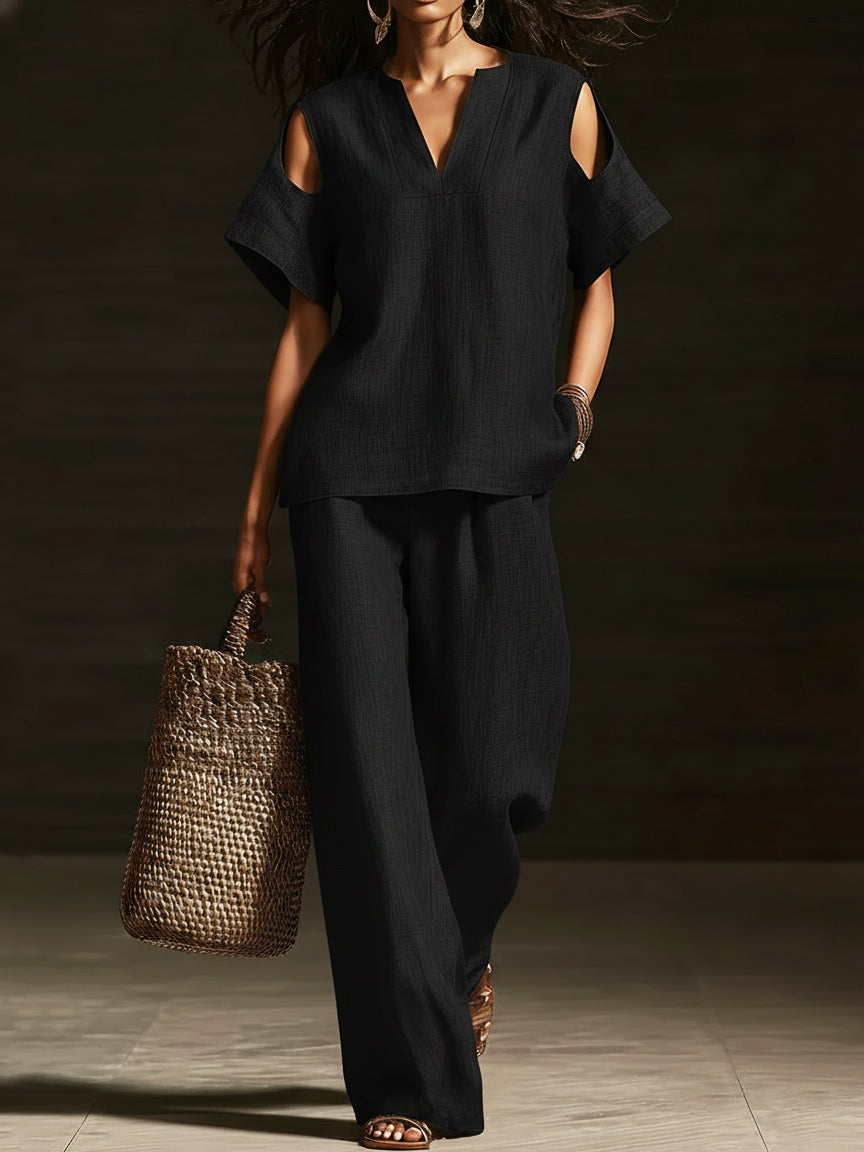 Set di due pezzi elegante con top off-the-shoulder e pantaloni a gamba larga