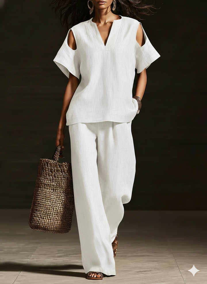 Set di due pezzi elegante con top off-the-shoulder e pantaloni a gamba larga