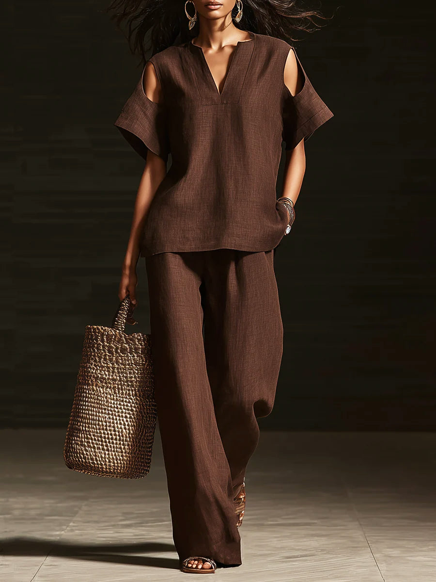 Set di due pezzi elegante con top off-the-shoulder e pantaloni a gamba larga