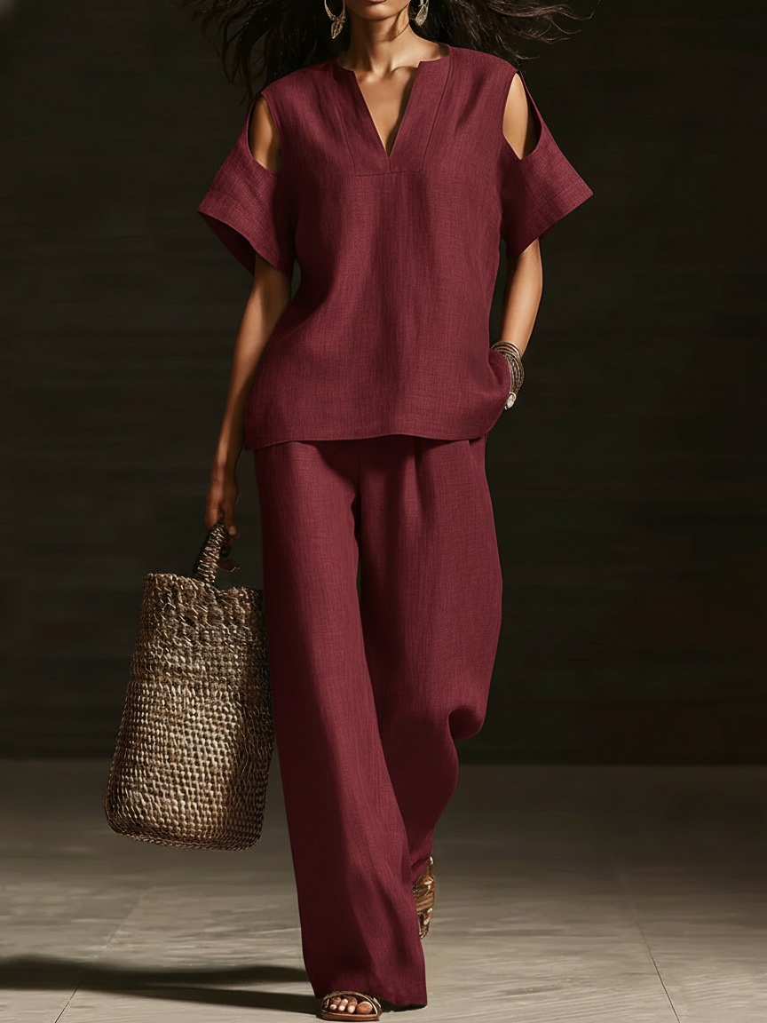 Set di due pezzi elegante con top off-the-shoulder e pantaloni a gamba larga