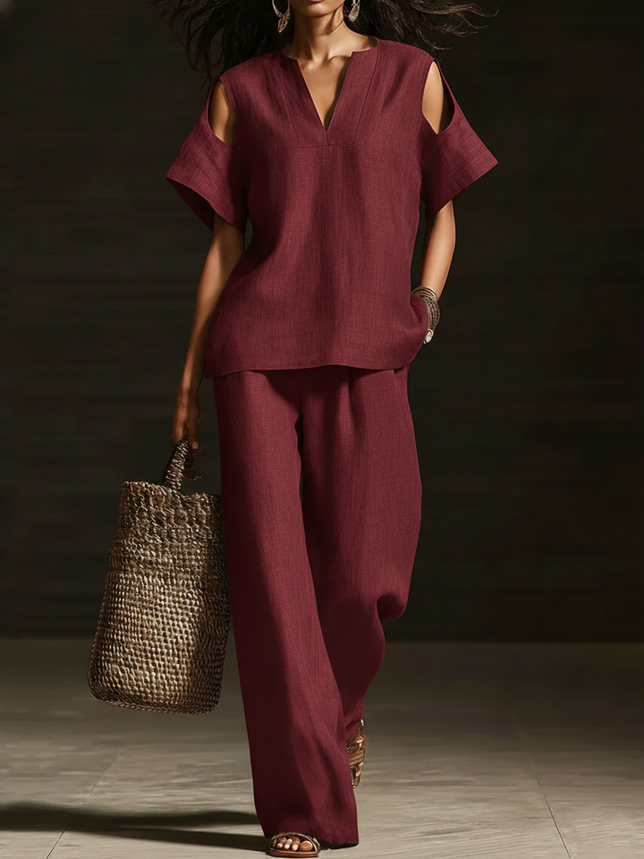 Set di due pezzi elegante con top off-the-shoulder e pantaloni a gamba larga