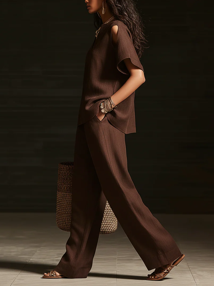 Set di due pezzi elegante con top off-the-shoulder e pantaloni a gamba larga